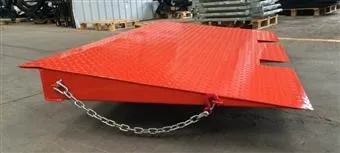Orange coloured Compact Forklift Ramp with fitted chains and lifting cut-outs.