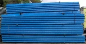 Blue coloured Used End Frames in assembled form and stacked on top of one aother.