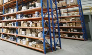 Pallet Rack Shelving made out of blue Beams and orange Frames plus Shelf Boards.