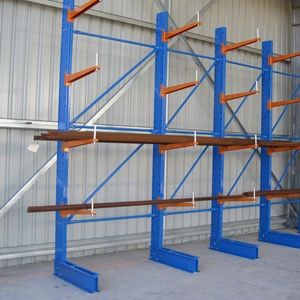 Here is a picture showing blue and orange Cantilever Racking supporting reinforcing bars with spigot pins fitted at the end of each arm.