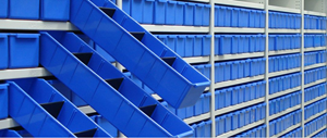 Blue coloured Parts Trays fitted within Steel Shelving.