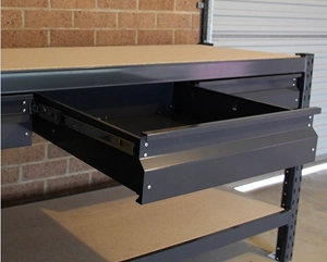 Steel Workbench with three dark grey drawers.