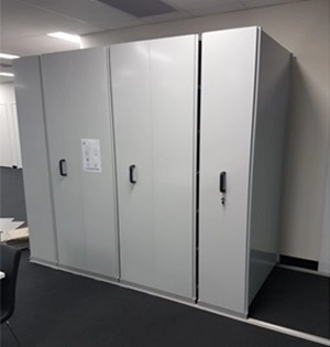 A used Compactus unit with six bays, front Cover Panels and lock system.